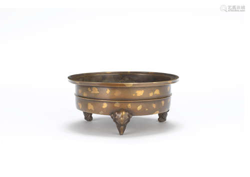 Xuande six-character mark, 18th century A gold splashed bronze incense burner