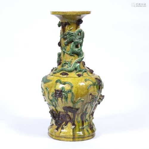 Glazed baluster vase Chinese, 19th/early 20th Century having raised green dragons and temple dogs