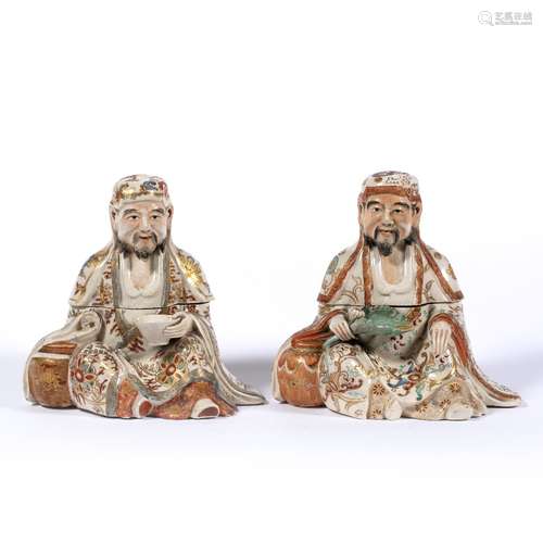 Pair of Satsuma lidded pots Japanese, Meiji in the form of seated figures one holding a bowl, the