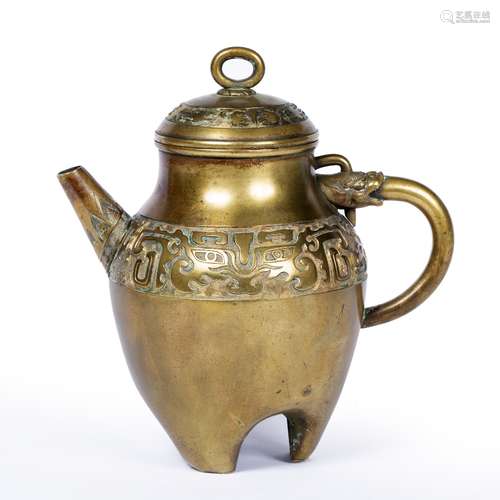 Brass Ewer Japanese, 19th Century decorated with a band round the body with Taotie motifs, on