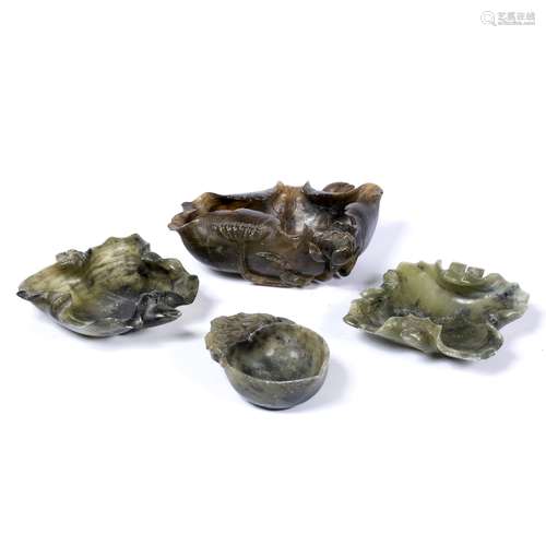 Four soapstone carvings Chinese three carved as open leaves and the fourth as a cup (4)