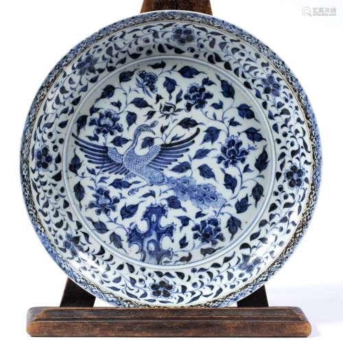 Blue and white dish Chinese decorated with a phoenix in flight 28cm across