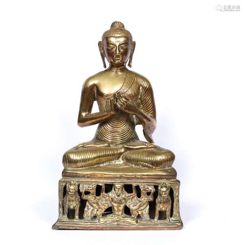 Bronze buddha 19th/20th Century seated crossed legged with the hands together, supported by a base