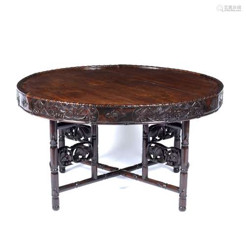 Circular folding table Chinese, late 19th Century with carved edge on bamboo carved support 88cm