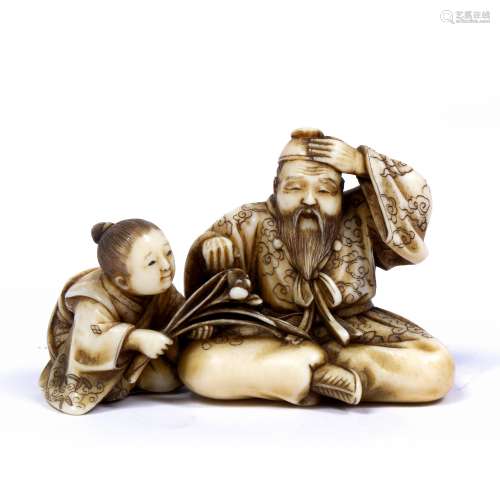 Ivory okimono Japanese of a seated bearded gentleman hand held to his forehead as a youth kneels