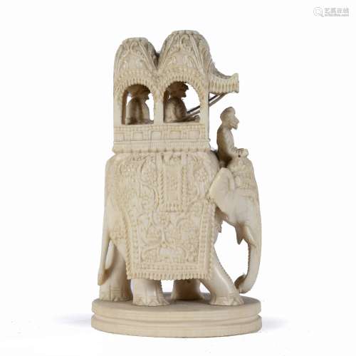 Ivory carved elephant and howdah Indian, circa 1900 the group having carved foliate scroll