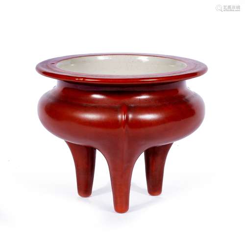 Porcelain li shaped incense burner Chinese, 19th Century decorated with a coral red glaze 16cm