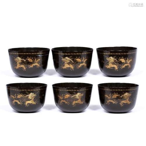 Six lacquer bowls Chinese, 20th Century each depicting two five clawed dragons chasing a central
