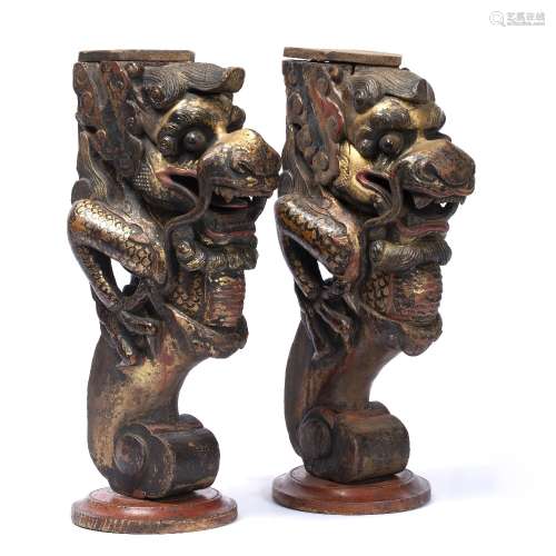 Pair of carved and gilded wood mounts Chinese, 19th Century each in the form of a dragon's head 40.