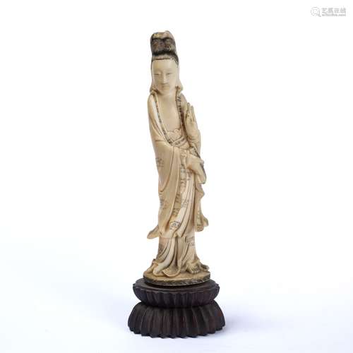 Ivory figure of a standing Xi Wang Mu Chinese, 1900-1920 holding a scroll with hands in mudra