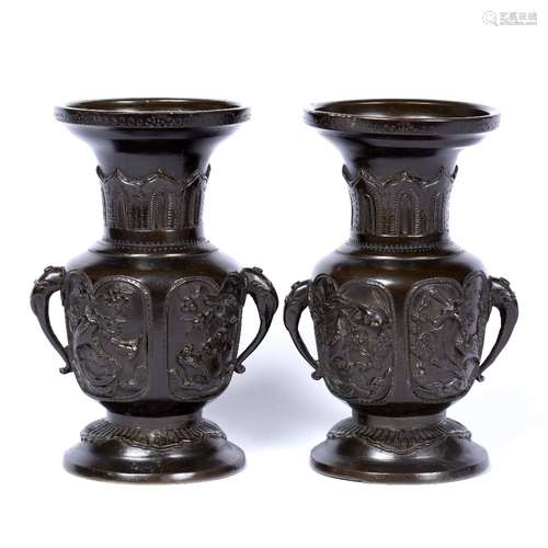 Pair of bronze baluster vases Japanese, Meiji period with elephant head handles, the body with