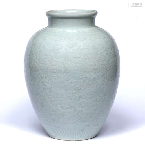 Celadon vase Chinese, 18th Century decorated with a raised floral decoration, with a ruyi head