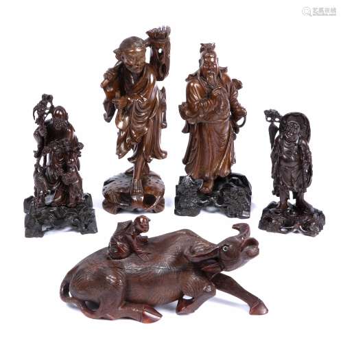 Six wood carvings Chinese, 20th Century including various figures and a buffalo (6)