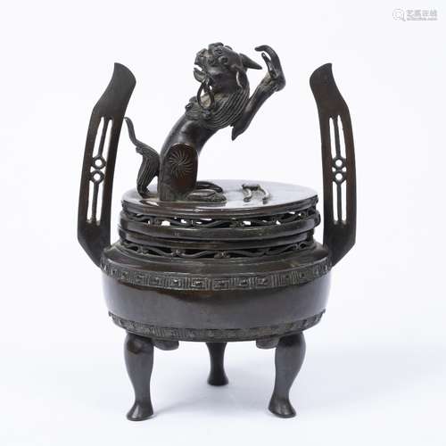 Bronze tripod censer Chinese, 19th Century with pierced handles, the lid mounted with a lion dog