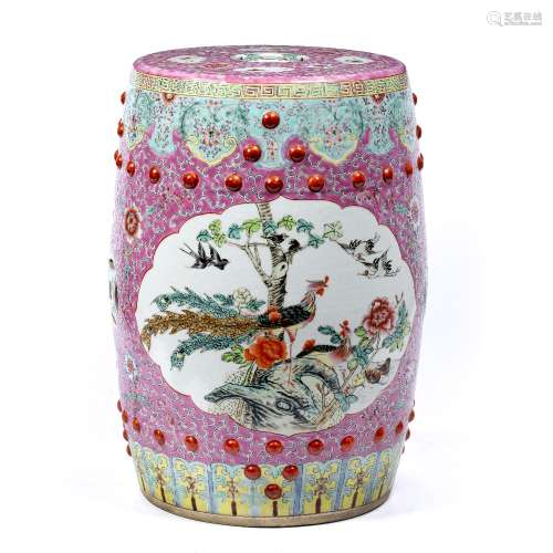 Famille rose garden seat Chinese, 20th Century of barrel form with shaped oval reserve panel with