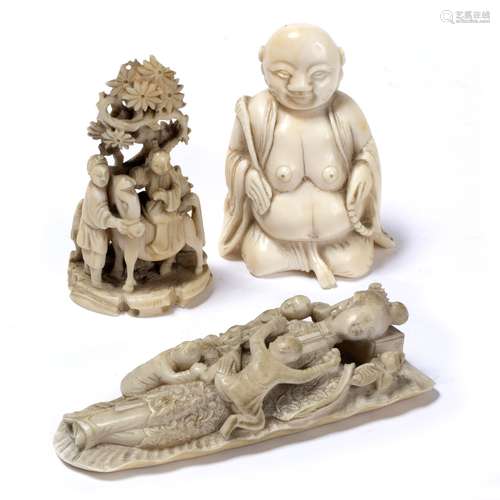 Ivory carving of a court lady Chinese, 1880-1900 reclining upon a large banana leaf holding a