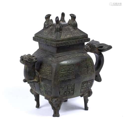 Archaic style bronze ewer Chinese, 19th/20th Century with mask head spout and stylised handle 29cm