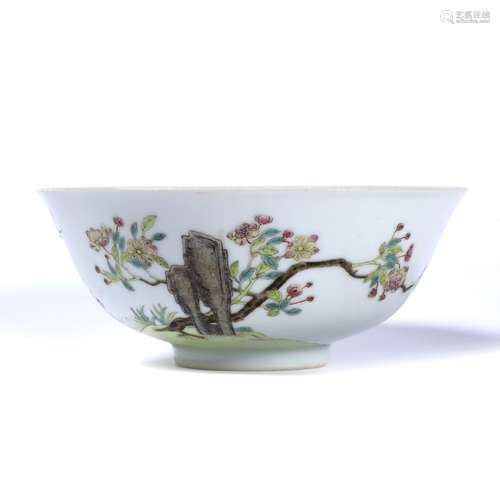 Famille rose bowl Chinese, 19th Century decorated to one side with a tall rock behind which a tree