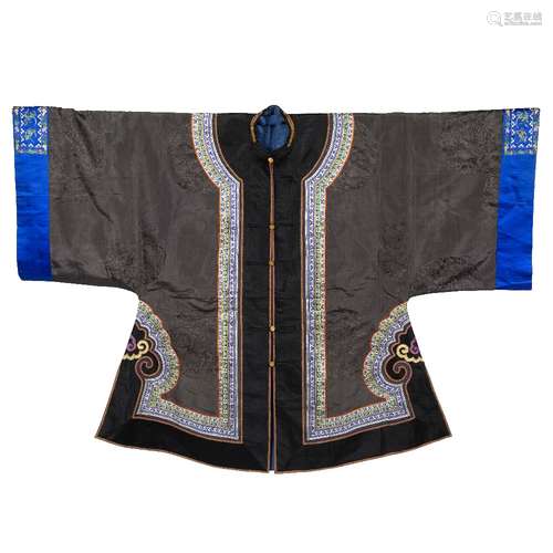 Silk coat Chinese, early 20th Century dark brown ground with embroidered edging and blue sleeve