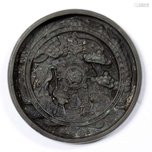 Bronze mirror Chinese, Han style circular panel having a central decorative knop surrounded by