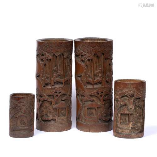 Four bamboo carved brush pots Chinese, 19th Century largest 29.5cm, smallest 13cm