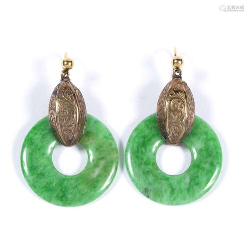 Pair of jade earrings Chinese of hoop-shaped form, with gold metal fittings