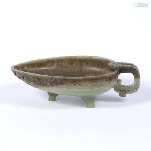 Open jade bowl Chinese, 19th/20th Century the border decorated with a scrolling pattern, with a loop