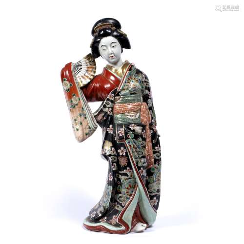Large Satsuma model of geisha Japanese, Meiji the girl holding a fan in her right hand and wearing a