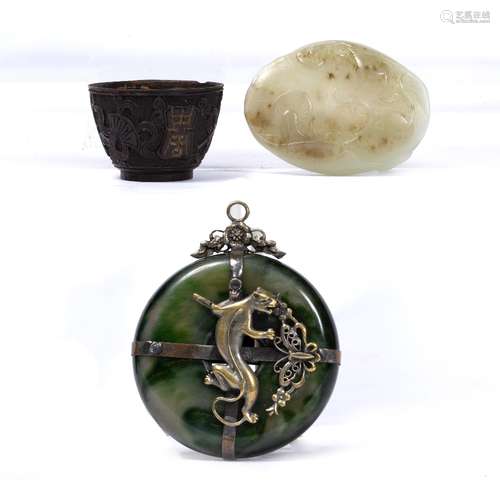 Jade and white metal pendant Chinese, circa 1900 having a raised shi-lin dragon 5.5cm a miniature