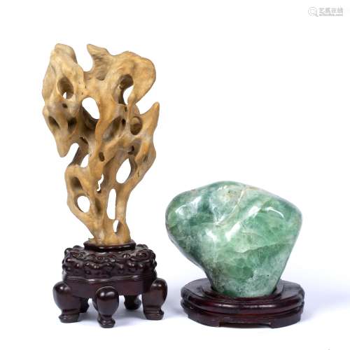 Two Scholars rocks Chinese, 19th Century the first decorated of pierced form, with a creamy hue,