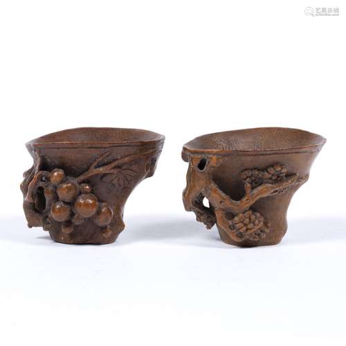 Two bamboo libation cups Chinese, 18th Century both shaped to imitate rhinoceros horn, the first