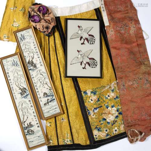 Group of textiles Chinese to include a yellow embroidered skirt, a hat, a signed panel and three