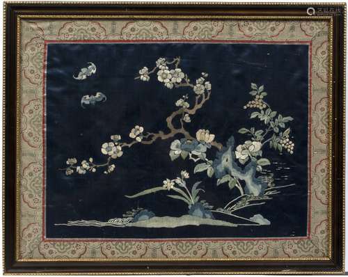 Three framed silk panels Chinese, 19th/early 20th Century including blue ground with blossom and