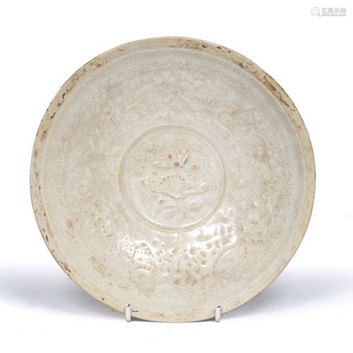 Qingbai dish Chinese, Song Dynasty with central relief moulded flower within a border of flying