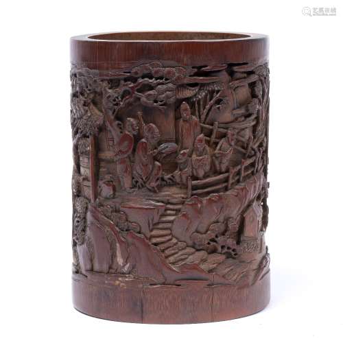 Bamboo brush pot Chinese carved with immortals in a bamboo grove, signed to one side 16.5cm high