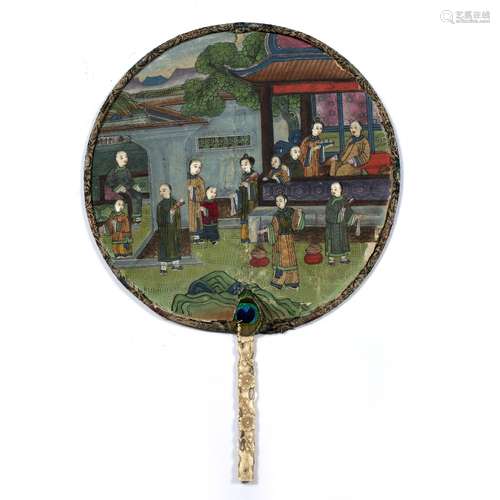 Circular fan Chinese, 19th Century of painted paper depicting a family of twelve set within the