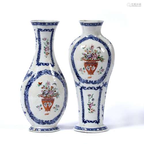 Inverted pair of famille rose vases Chinese, 18th Century each painted with vases of flowers