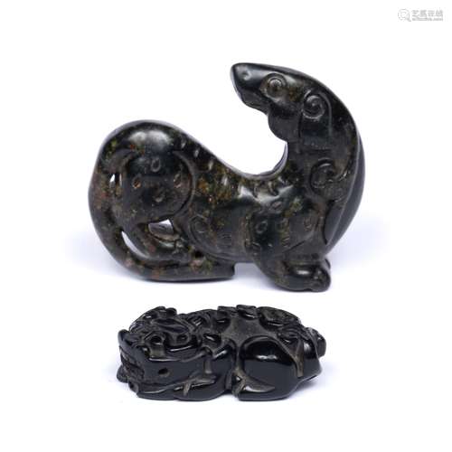 Carved black jet stone model of a horse Chinese in the Ming style with head turned to the reverse