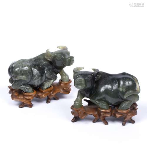 Pair of soapstone carved water buffalo Chinese, early 20th Century the animals with heads turned