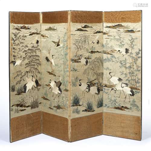 Embroidered four fold screen Chinese, late 19th Century embroidered with cranes in a river landscape