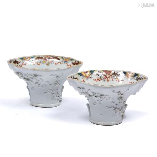 Pair of famille rose libation cups Chinese, 18th Century the exterior with raised insects and