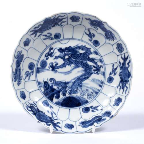 Blue and white porcelain saucer dish Chinese, 19th Century with central dragon and flaming pearls
