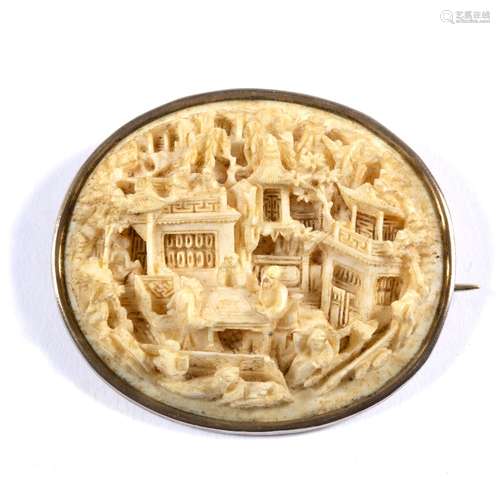 Oval Cantonese ivory brooch Chinese, late 19th Century intricately carved with figures at a gaming