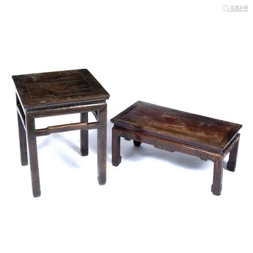 Two hardwood tables Chinese the low table decorated with a simple carved design to the centre