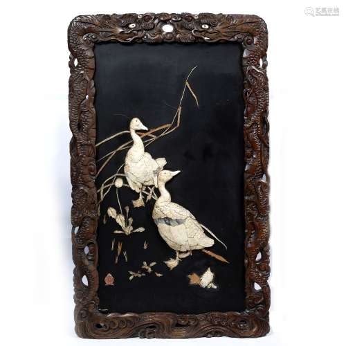 Lacquer and bone panel Japanese, Meiji depicting two geese within a carved dragon frame, with