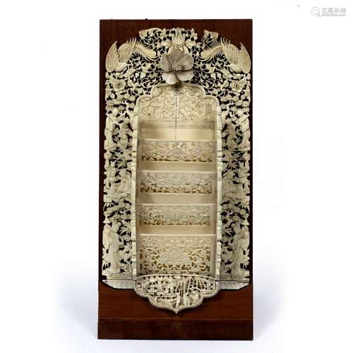 Canton ivory letter rack Chinese, 19th Century carved with a flower head and open fret work sides