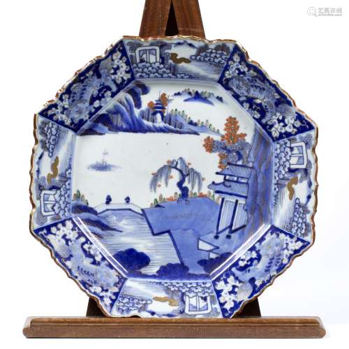 Hizenware large charger Japanese, 19th Century centrally decorated with bridge and river scene