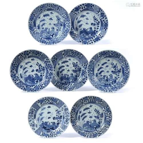 Seven blue and white plates Chinese, 19th Century each painted with rockwork, birds and insects