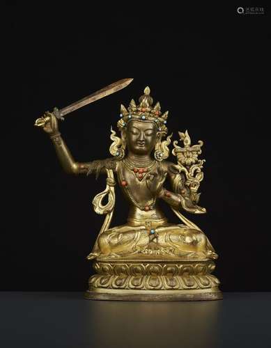 AN 18TH CENTURY BRONZE MANJUSHRI