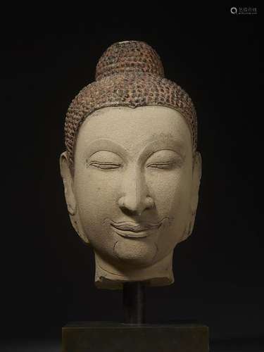 AN IMPORTANT VERY LARGE BUDDHA HEAD